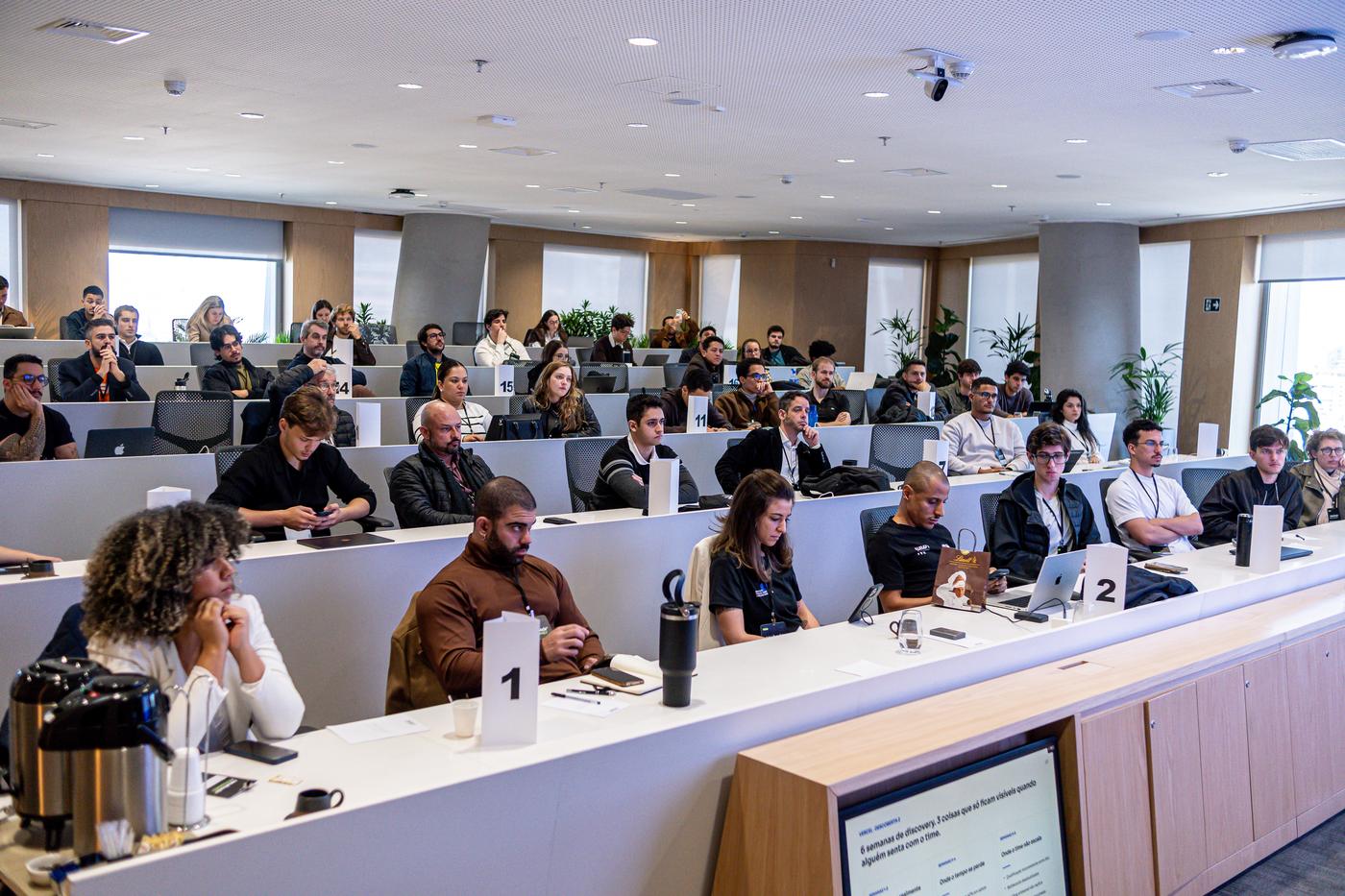 Room full of founders following the Journey content